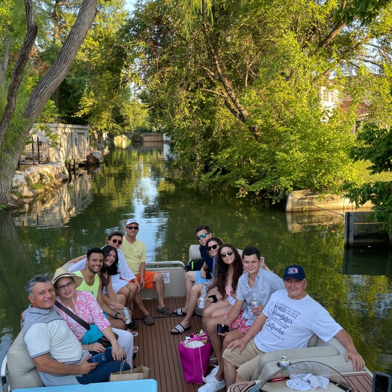 a group of people sitting on a bench